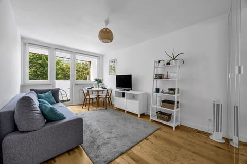 Living Room with Sofa, Smart TV and Dining Table | Book Now with RENTUJEMY.COM