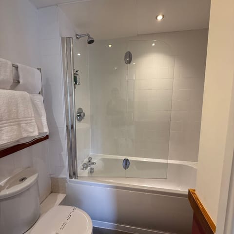Family Triple Room | Bathroom | Combined shower/tub, free toiletries, hair dryer, towels