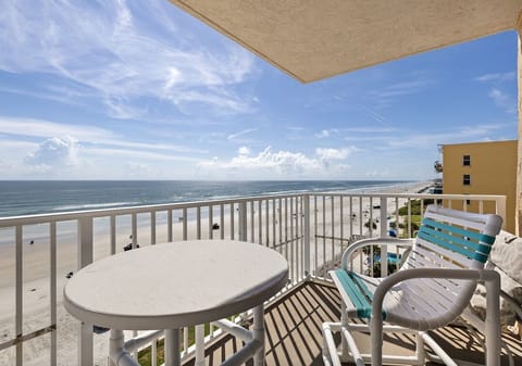Relax on your private balcony with stunning oceanfront views. Enjoy morning coffee or sunset drinks just steps from the beach—perfect for your next coastal getaway.