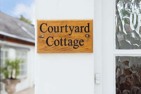 Courtyard Cottage sign 