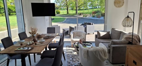 Comfort House, Garden View | Living area | 102-cm LED TV with digital channels