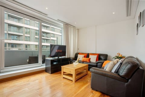 Spacious living room featuring a comfy sofa, perfect for relaxing.