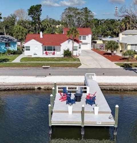 Front house, back house, large driveway and our dock