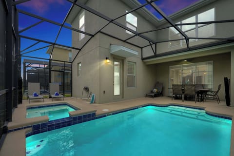 Relax in your private screened-in pool & spa 