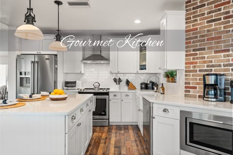 Cook up memorable meals surrounded by sleek design and warm, rustic accents!