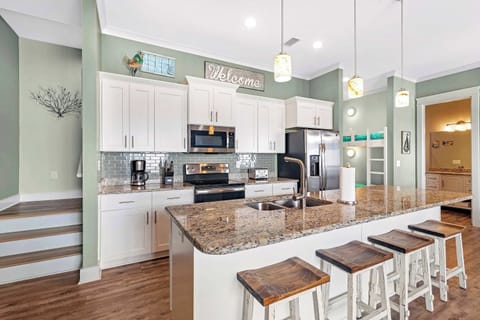 The open, airy kitchen offers ample space & every home comfort​