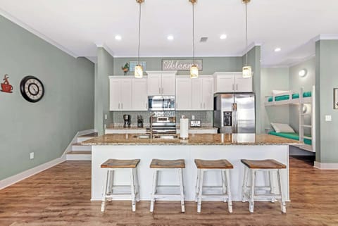 The open, airy kitchen offers ample space & every home comfort​