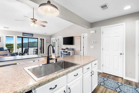 The open kitchen offers ample space & every home comfort​