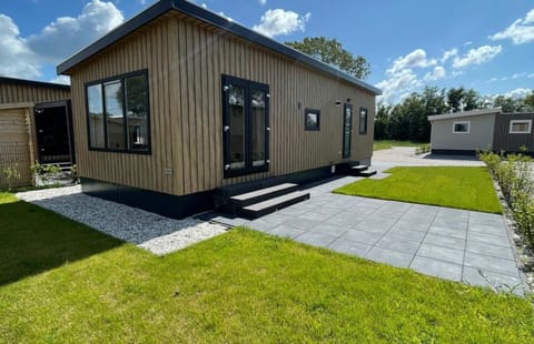 Front and garden of Holiday Park De Zeeuwse Parel - North Sea