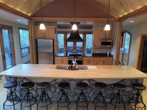 Lots of seating around the island! Everything you need to cook too.