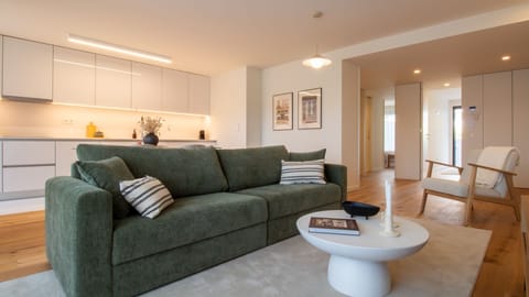 A cozy and modern living room with a soft green sofa and minimalist décor. 
#comfort #modern #decor #design #portugal #pt #VilaNovaDeGaia