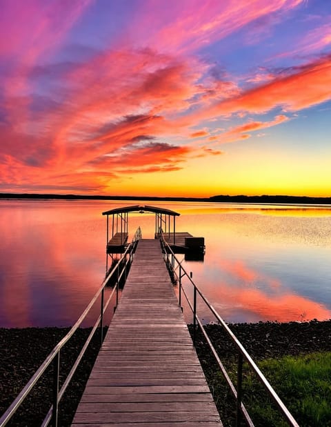 Beautiful sunset in rich, shifting hues over the lake