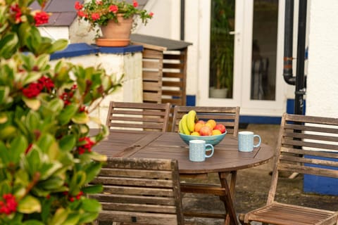 Patio doors leading from the sitting/dining room to patio area