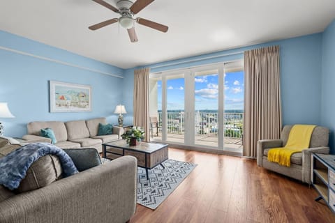 Bright Living Room – Comfortable seating with direct access to the balcony and stunning views.