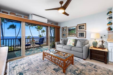 Condo, 1 Queen Bed with Sofa bed, Lanai, Ocean View (Kona Isle E21) | Living area | 42-inch flat-screen TV with digital channels