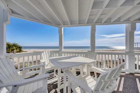 Sip your morning coffee at this charming beachfront table while endless ocean views stretch before you.