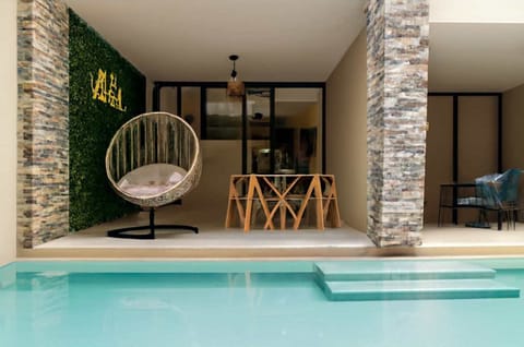 Relax by the lazy river on this inviting covered patio.