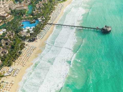 On the beach, beach cabanas, sun loungers, beach umbrellas