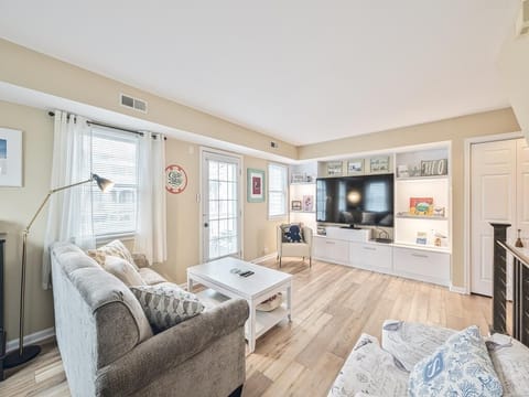 Relax and unwind with smart TV entertainment and plush seating in this comfortable living area.