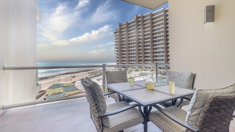 dining table for four out on the balcony
