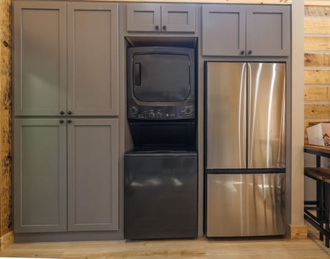 The Bears Den - Kitchen with plenty of storage, washer & dryer, and refrigerator