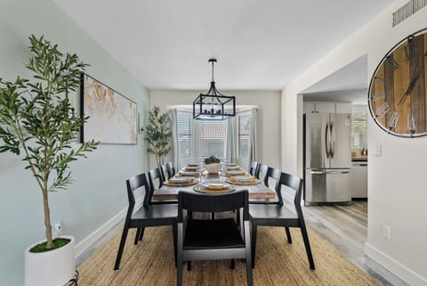 Dining Room: Overlooking the kitchen, the dining room flows effortlessly into the heart of the home, creating the perfect setting for shared meals, celebrations, or casual nights in.