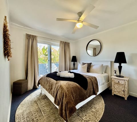 Beautiful new Queen bed for your peaceful nights rest. Ceiling fan for comfort too.
