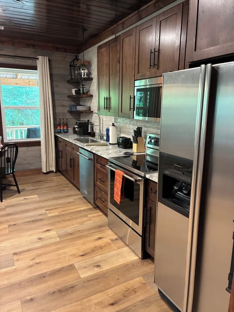 Modern updated kitchen with convection oven and leatherized granite