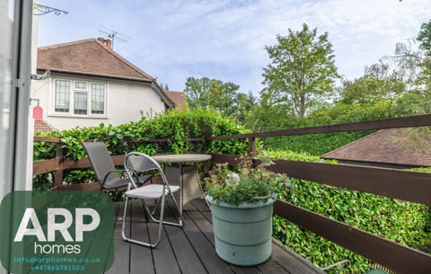 Spacious deck with comfortable seating — perfect for evening drinks.