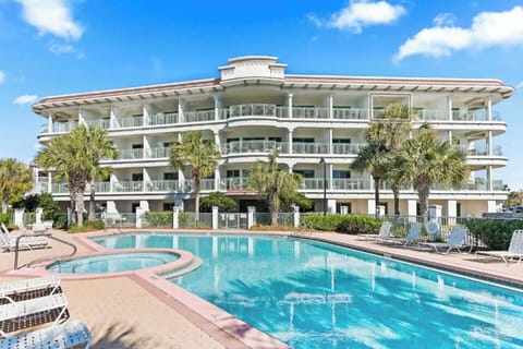 Unwind and rejuvenate with our private pool and hot tub, conveniently located just outside your door.  Spend your days relaxing by the pool, reading a book, or exploring the beautiful beach.