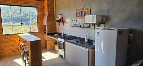 Basic Chalet | Private kitchen | Full-size fridge, microwave, oven, stovetop