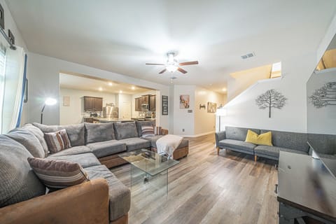 Spacious lounge area with stylish furniture and entertainment options.