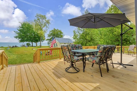 This deck understood the assignment. Lake views, umbrella shade, and major outdoor brunch potential.