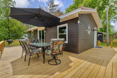 Outdoor dining, tropical cushions, and plenty of space to kick back—yes, even the grill is ready to party.