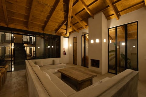 Deluxe Villa, 4 Bedrooms | Living area | Fireplace