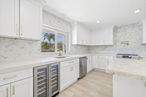 Kitchen is very light and offers plenty of countertop space for cooking.