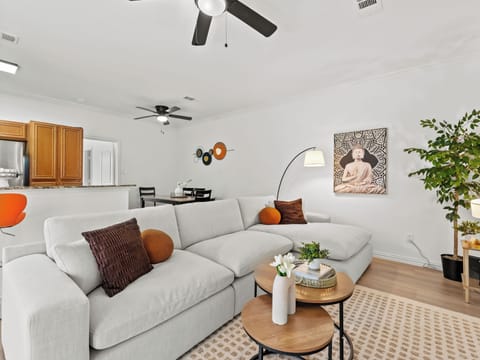 Step into a bright, open-concept living area that blends comfort and elegance.