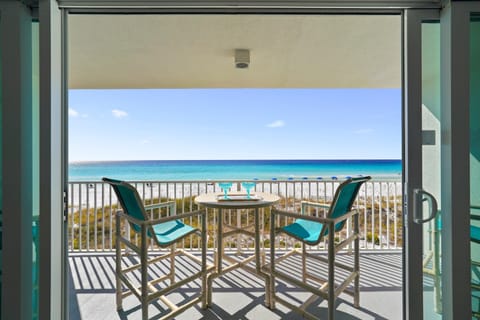 Your private front-row seat to the Gulf, sip morning coffee or sunset cocktails while overlooking white sands and endless emerald waters.