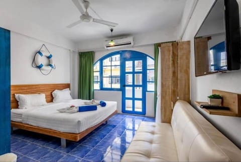 Deluxe Double Room, Balcony | Minibar, in-room safe, iron/ironing board, free WiFi