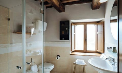 Triple Room, Courtyard View | Bathroom | Hair dryer, slippers, towels, soap