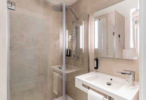 Shower, rainfall showerhead, eco-friendly toiletries, hair dryer