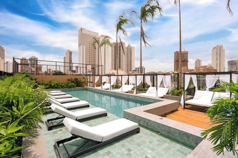 Indoor pool, outdoor pool, pool umbrellas, sun loungers