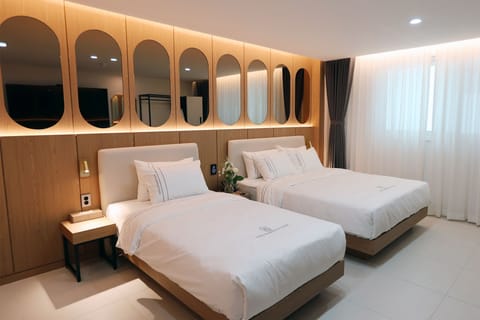 Premium Twin Room, Multiple Beds, Non Smoking, Private Bathroom | Down comforters, desk, laptop workspace, free WiFi