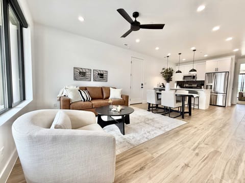 Large windows, plush furnishings, top of the line appliances, and a bright open floow plan make this space convenient and comfortably