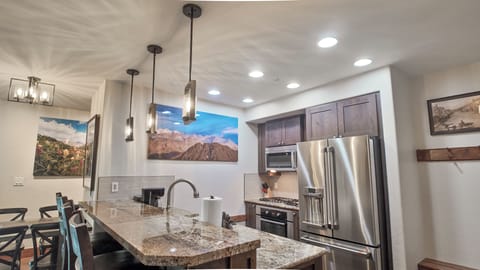 Granite kitchen with stainless steel appliances