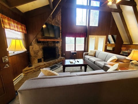 Signature Chalet, 3 Bedrooms, Patio, Mountainside | Living room | 32-inch Smart TV with cable channels, fireplace