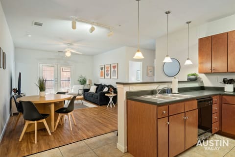 Cook and stay connected. The kitchen flows right into the living and dining space.