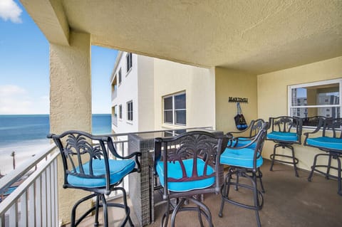 Relax on the spacious balcony w/ comfy seating & a dining table, perfect for enjoying fresh air & water views.