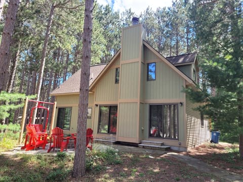 OVERVIEW:  The front of the cabin in summer