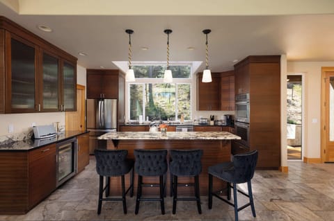 The elegant kitchen offers ample space & all the comforts of home​